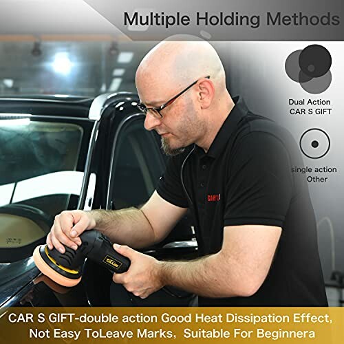 Person using a dual action car polisher on a vehicle.